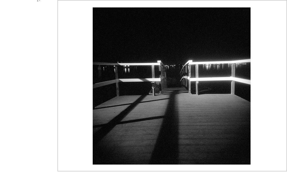 High contrast geometry with dramatic shadows on a Balboa Island, California pier