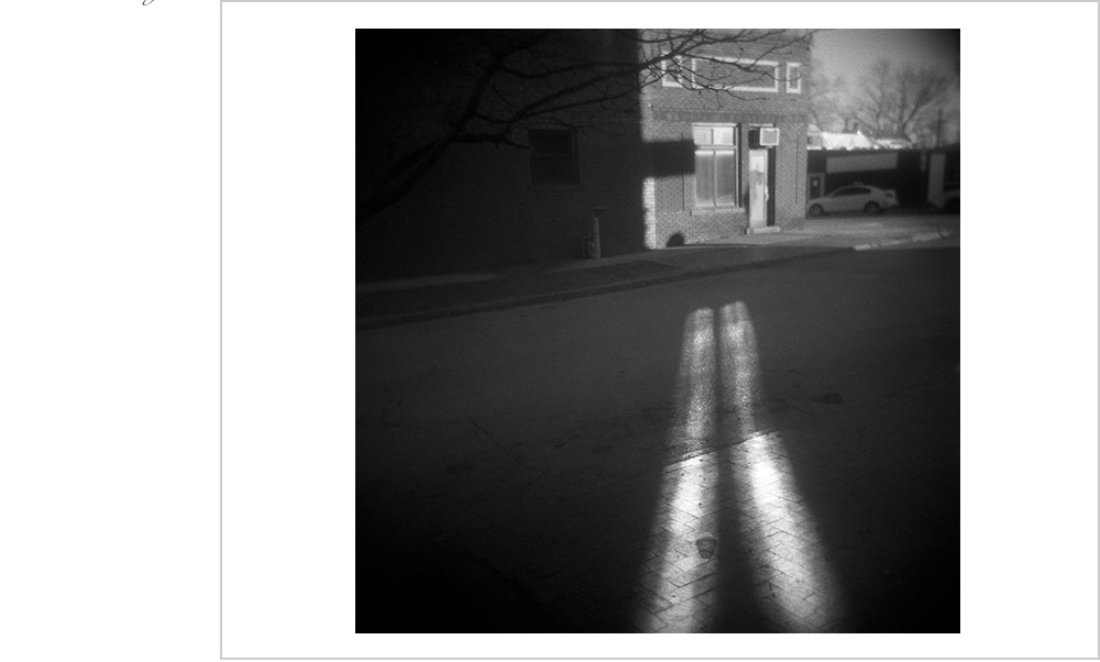 The sun reflects off windows from a downtown building in Omaha, Nebraska.