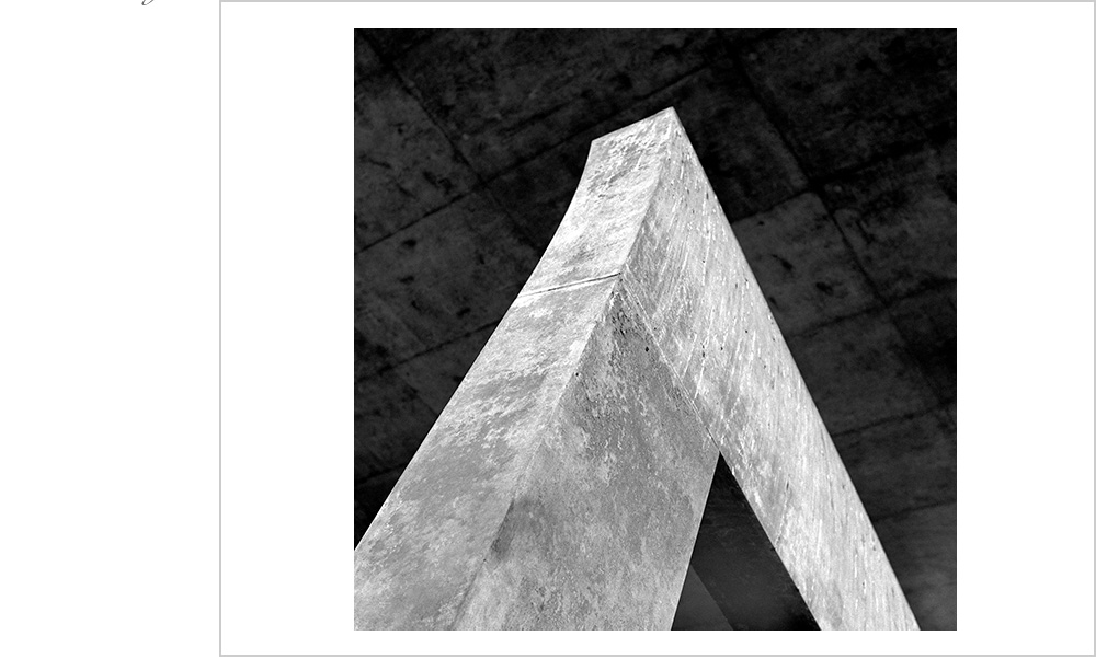 Massive concrete monolith at the entry to a B.A.R.T. station in Oakland, California.