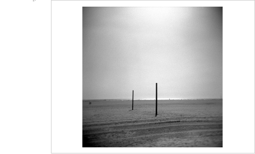 Perhaps it will be the two people off in the distance that will play volleyball on this brooding court in Venice Beach, California.