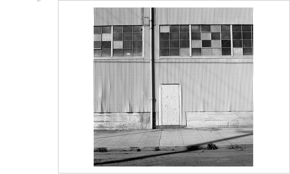 The windows in these old industrial buildings of Oakland, California remind me of computer code.
