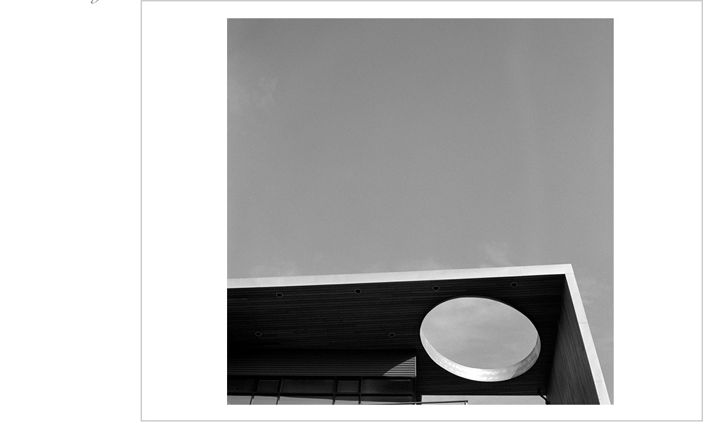 The title refers not to the ease with which this photo was taken, because it's actually very hard work that only a genius could make look so easy. It refers to the circle, triangle, and rectangle in the image. Rudimentart shapes.