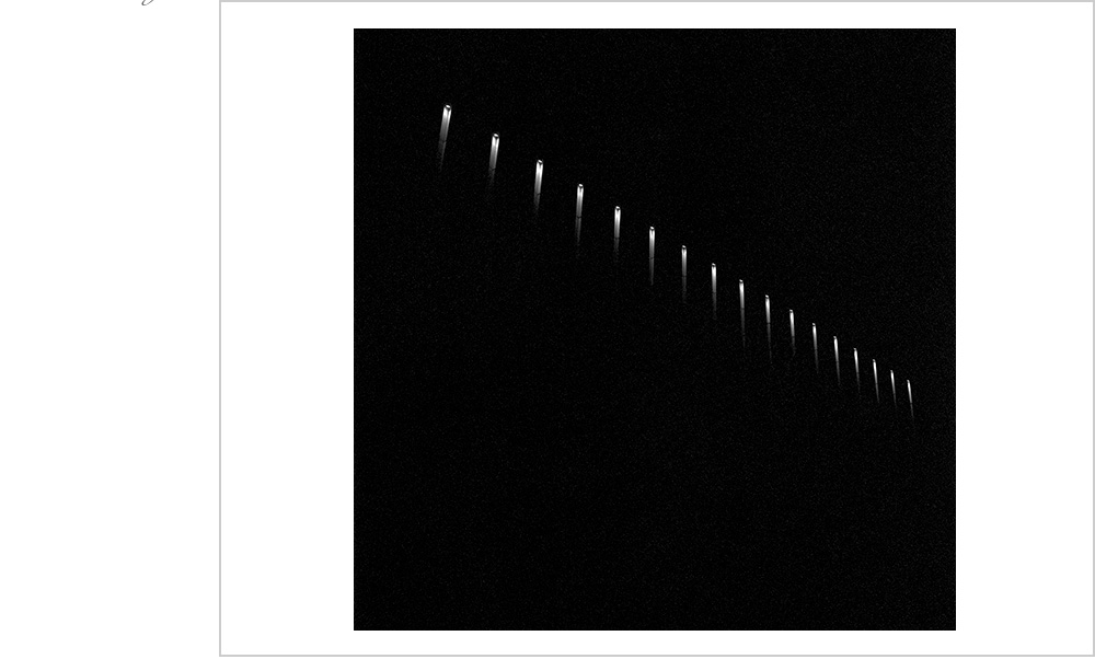 A row of lights seemingly lighting the way to unreachable heights. Good thing that I'm not afraid of heights