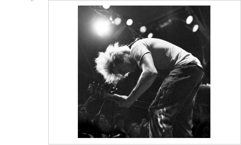 John Devoto of the Matches gets into it at the all ages venue, iMusiccast in Oakland, Ca..