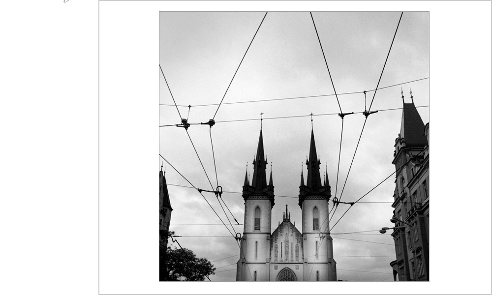 Trollet wires frame this historic church in Prague.